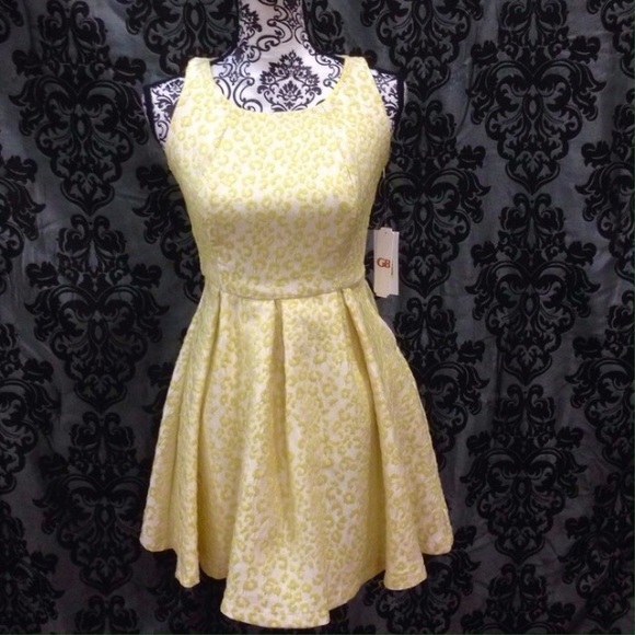 Gianni Bini Dresses & Skirts - NWT Gianni Bini Lemon Yellow Cutout Skater Dress